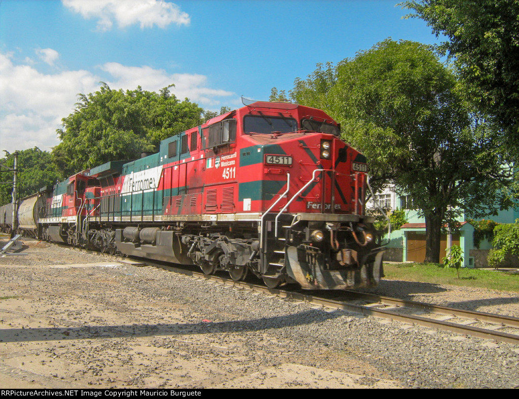 FXE AC4400 Locomotive leading a train